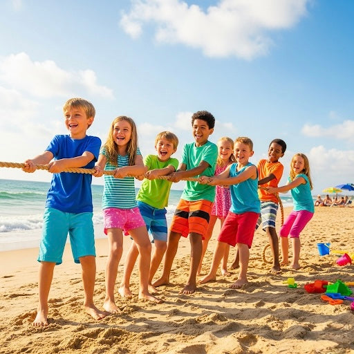 Kinder spielen Tauziehen am Strand – Symbol für Teamgeist, Zusammenhalt und soziale Verantwortung bei BabyLions