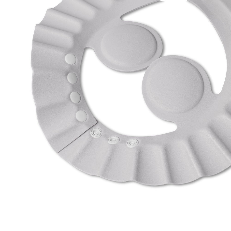 Graue Baby Duschhaube mit verstellbaren Druckknöpfen zum Schutz der Augen und Ohren beim Haarewaschen für Babys und Kinder
