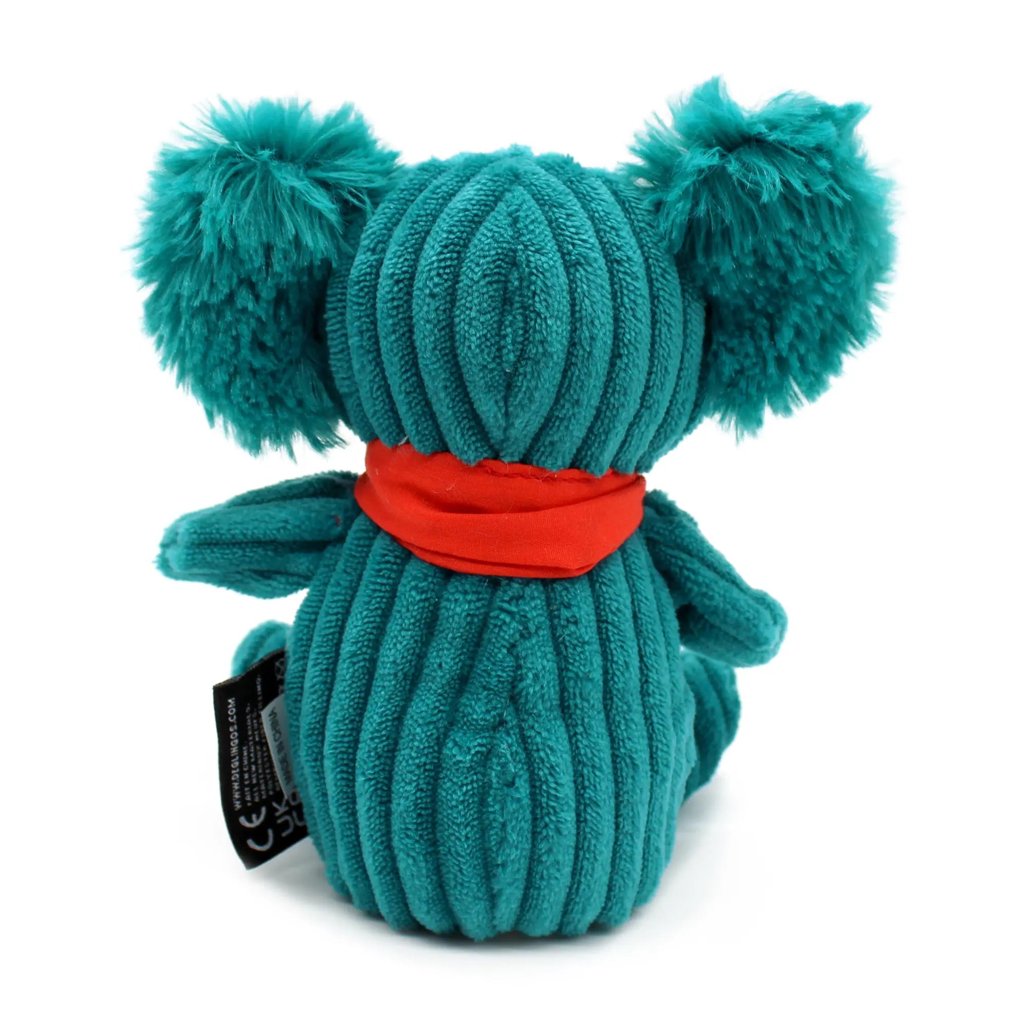 Rückseite eines türkisen Koala Kuscheltiers aus weichem Cordstoff mit flauschigen Ohren und roter Schleife