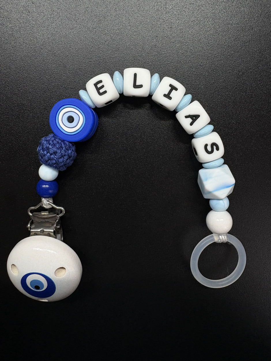 Personalisierte Schnullerkette Elias mit Bösem Auge in Blau Weiß mit Holzclip und Silikonring
